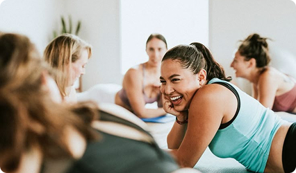 Instructor leading meditation for students